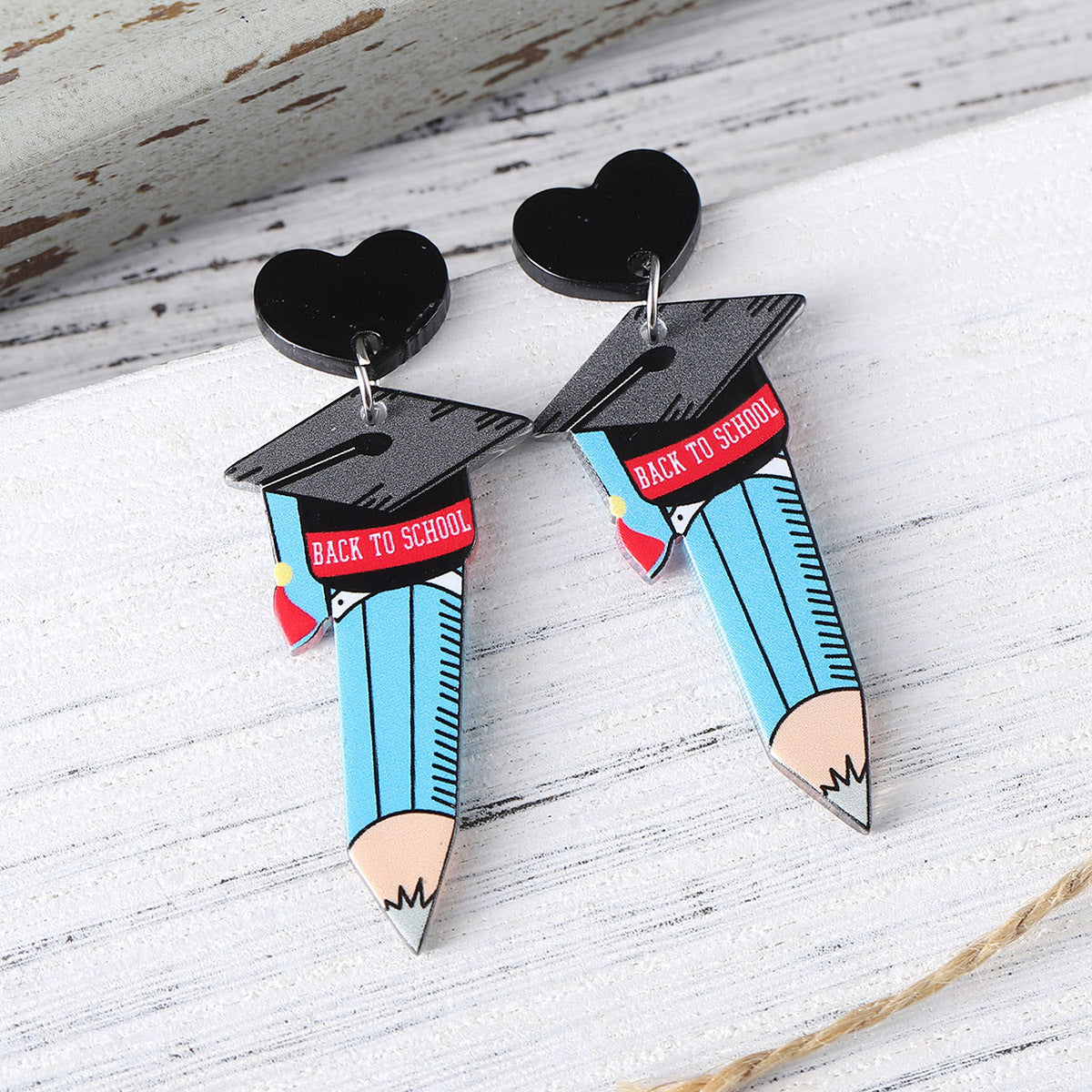 Acrylic pendant earrings for the graduation season of the school season